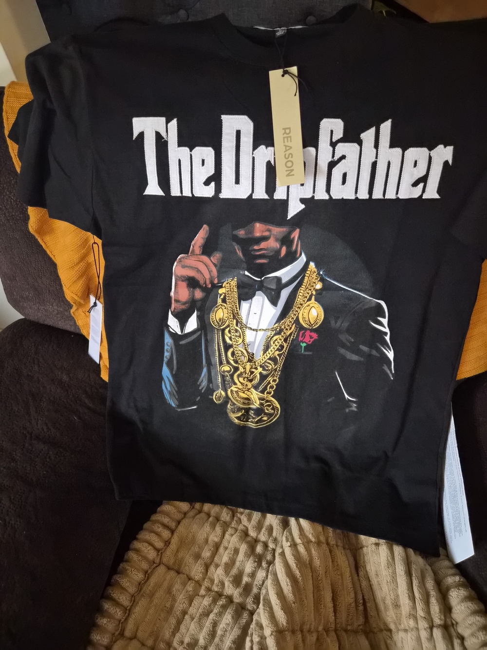 Reason Black 'The Dripfather' Graphic Tee with Gold Chain Artwork